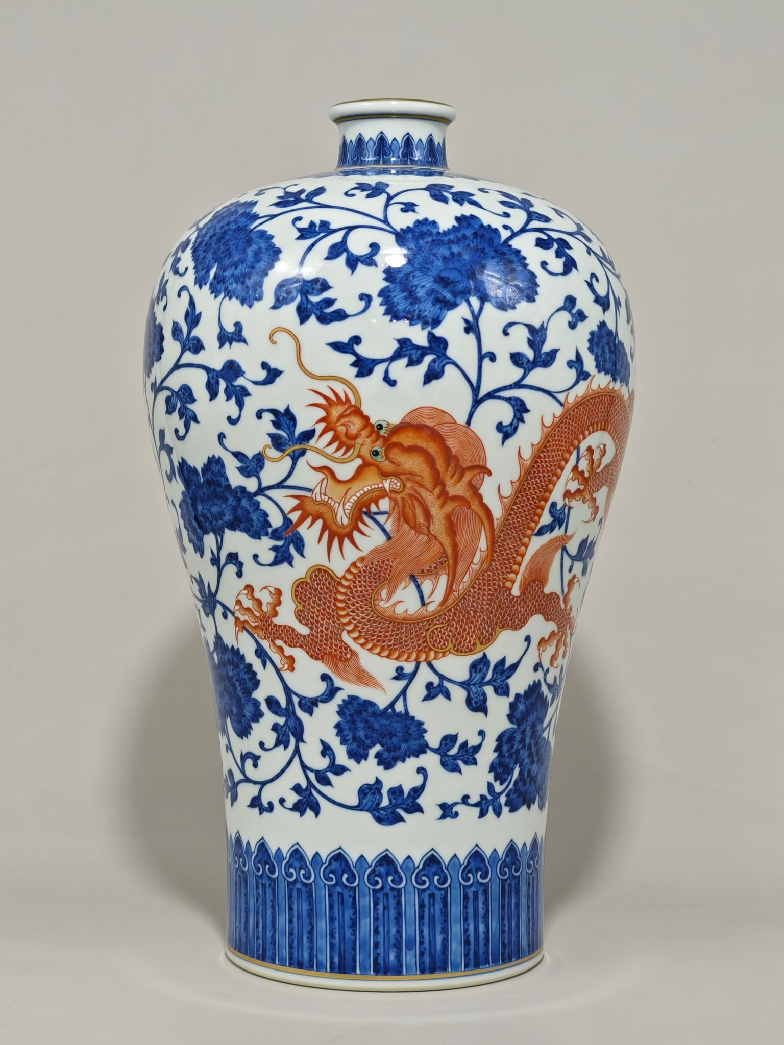 An Exquisite Iron-Red Blue and White Dragon and Phoenix Pattern Lotus Pattern Vase: An Exquisite Iron-Red Blue and White Dragon and Phoenix Pattern Lotus Pattern Vase Qing Dynasty, China Qianlong Six-character Mark Size:14.2inx8.7in花缠枝莲矾红(