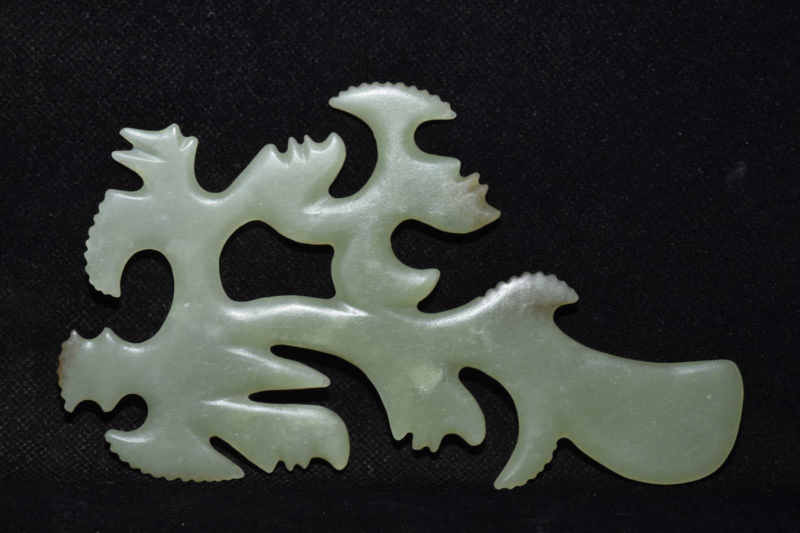 An Exquisite Hemo Jade Ornament: An Exquisite Hemo Jade Ornament Hong Shan Culture Size:3.9inx6.1in Weight:60g河磨玉佩摆件 红山文化 Size:10cmx15.5cm Weight:60g