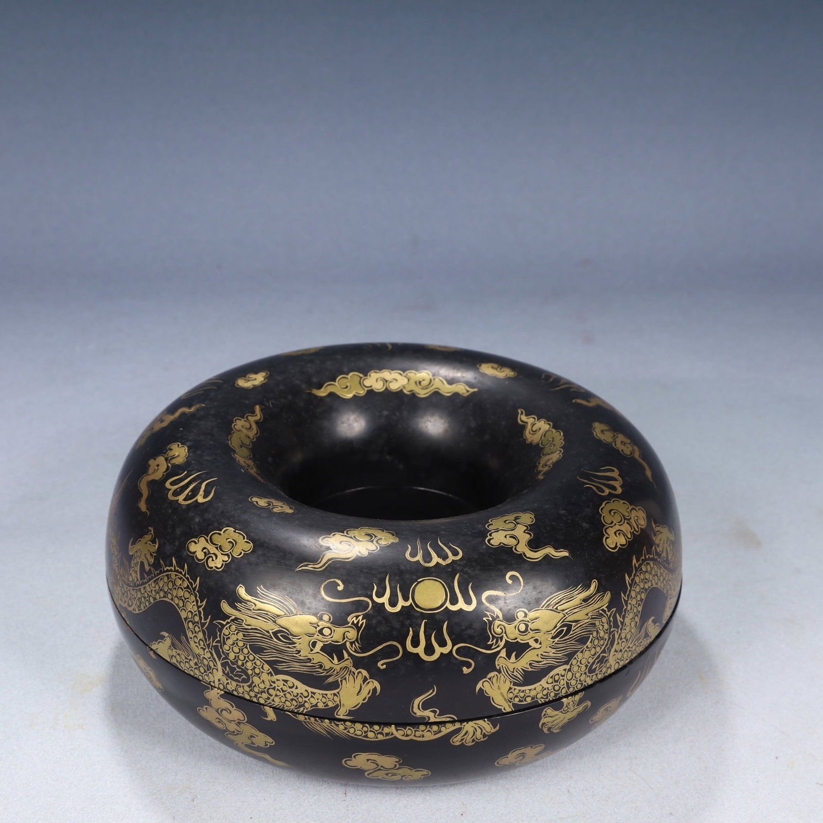 An Exquisite Black Lacquer Painted Gold Auspicious Cloud and Dragon Pattern Cover Box,With Eaglewood: An Exquisite Black Lacquer Painted Gold Auspicious Cloud and Dragon Pattern Cover Box,With Eaglewood Bracelets,Qing Dynasty, China,Qianlong Six-character Mark,Size:7.9inx7.5in,Weight:800g 黑