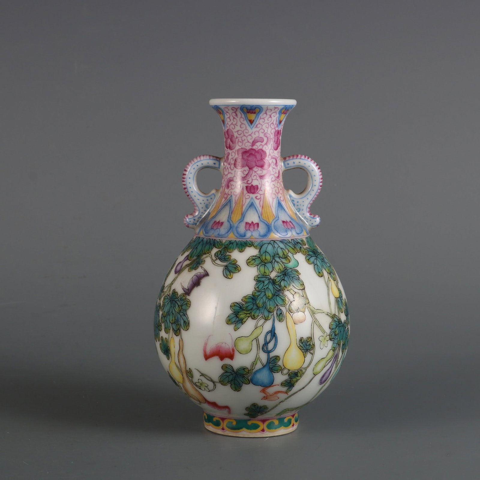 An Exquisite Enamel Bats and Gourd Pattern Double-Ears Vase: An Exquisite Enamel Bats and Gourd Pattern Double-Ears Vase,Qing Dynasty,China,Qianlong Four-character Mark,Size:6.6inx3.7in 珐琅彩蝙蝠葫芦纹双