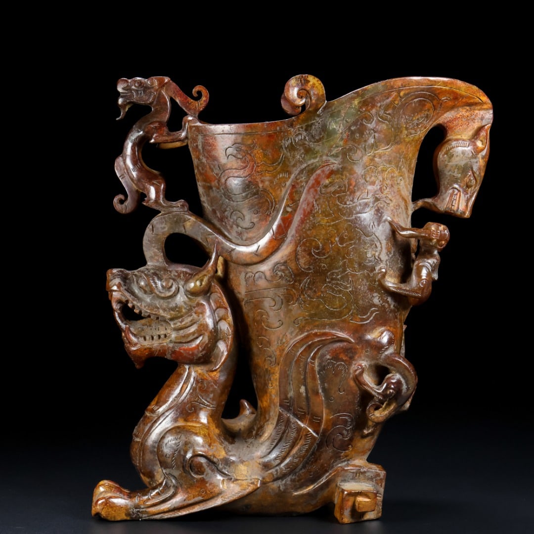 An Archaic Gaogu yu Dragon Pattern Goblet: An Archaic Gaogu yu Dragon Pattern Goblet,Ancient Time, China,Size:9.9inx8.5inx3.6in,Weight:3.19kg 高古玉龙纹爵杯,中国远古时