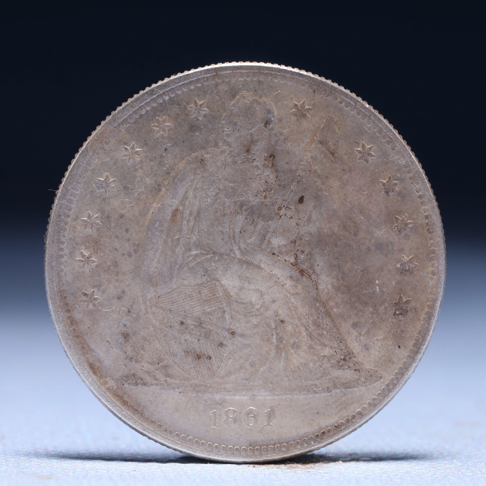 USA One Dollar 1861 Coin: American coin. IN GOD WE TRUST / LIBERTY / 1861 / UNITED STATES OF AMERICA / ONE DOL. Weight:26.9g.