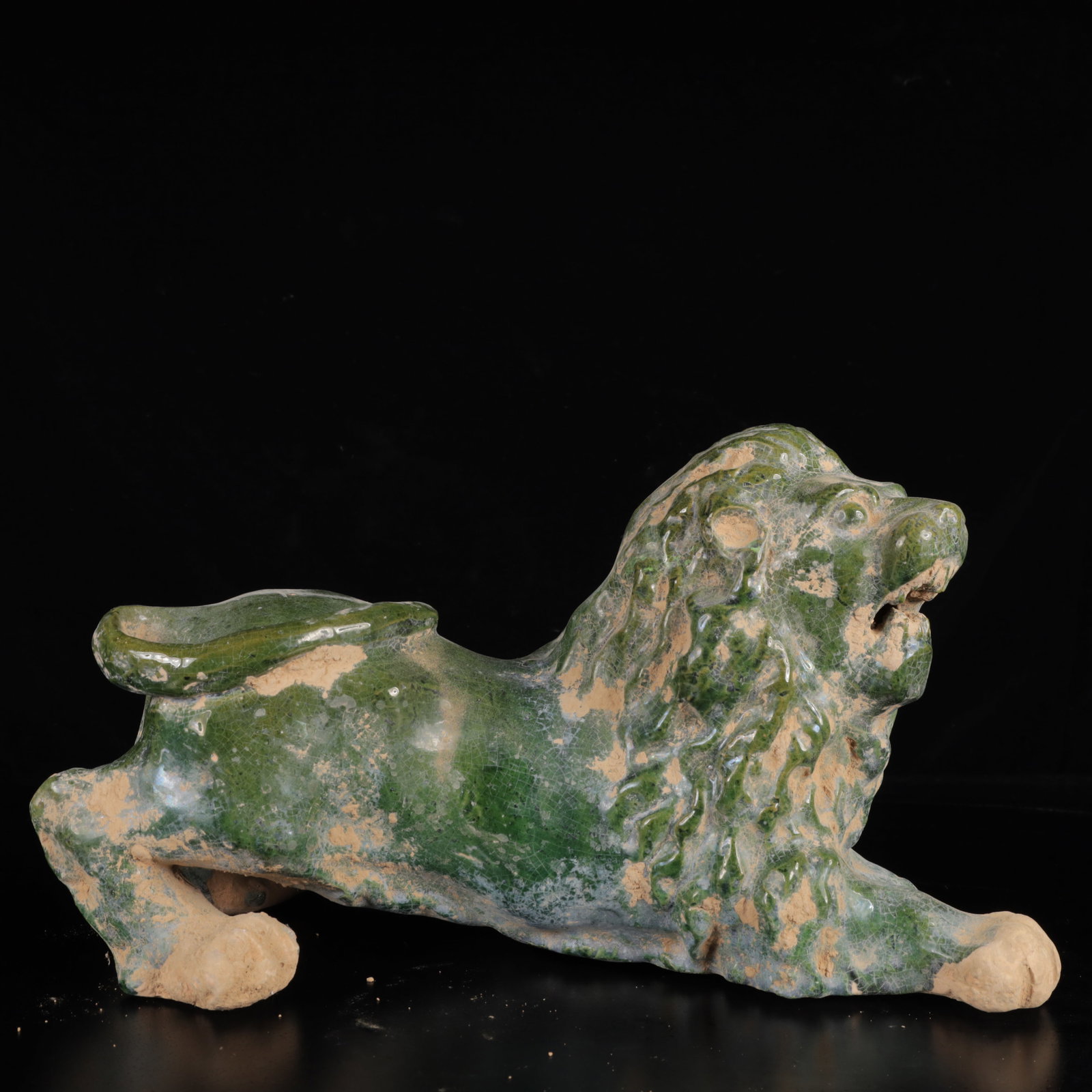 An Exquisite Tang Tri-Color Glazed Pottery Lion Ornament (1 of 9)
