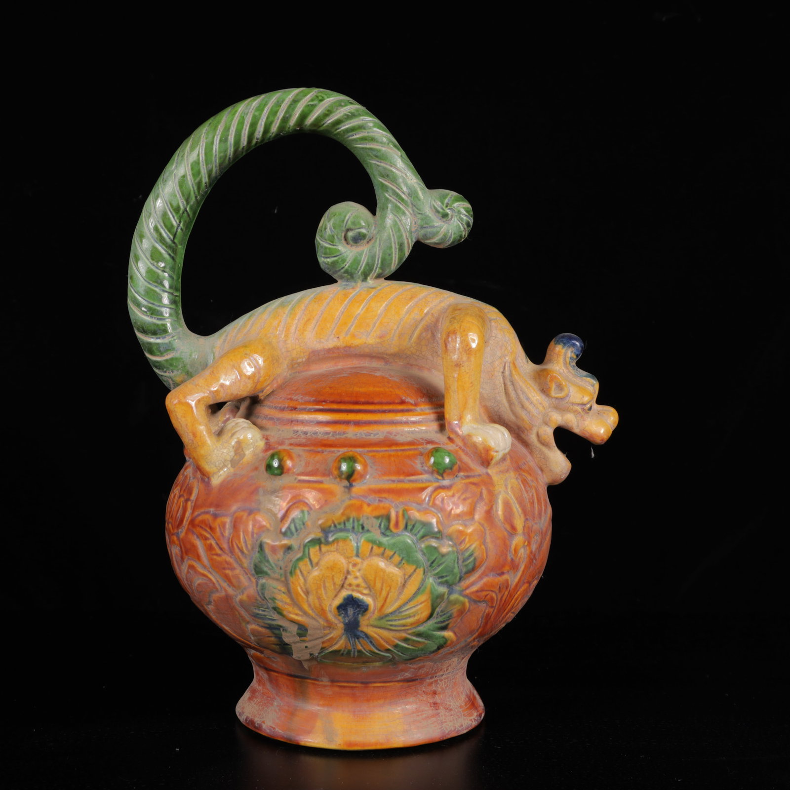 An Exquisite Tang Tri-Color Glazed Pottery Animal Ewer: An Exquisite Tang Tri-Color Glazed Pottery Animal Ewer,Tang Dynasty,China,Size:11inx8.3inx6.7in,Weight:1350g 唐三彩动物执壶,中国唐代