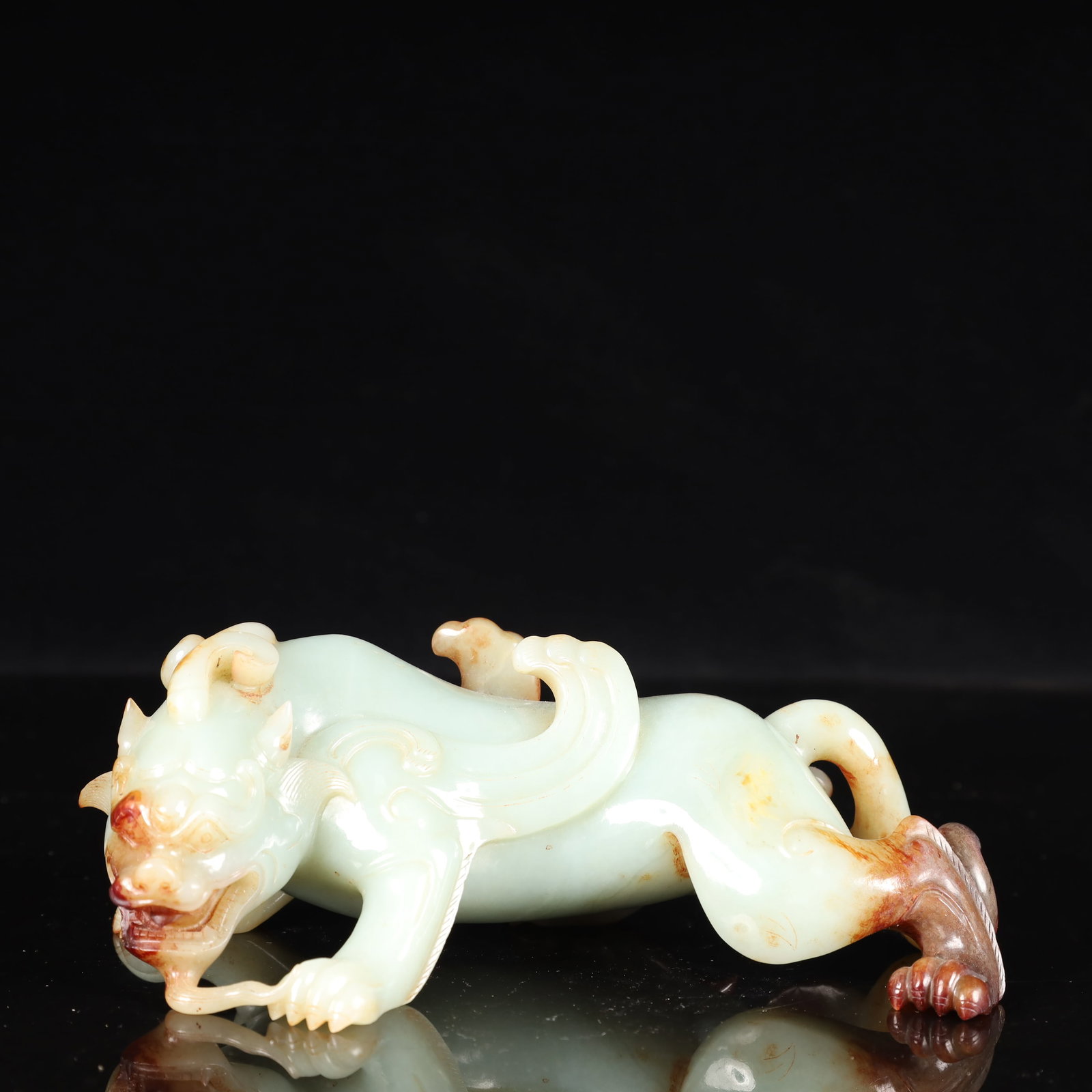 An Exquisite Gaogu Jade Auspicious Beast Ornament: An Exquisite Gaogu Jade Auspicious Beast Ornament,Ancient Time, China,Size:6.7inx3.5inx2.6in,Weight:850g 高古玉瑞兽摆件,中国远古ਲ