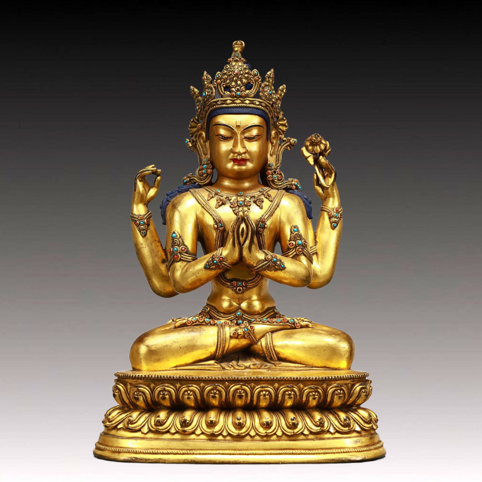A Solemn Gilt Bronze Statue of Four-arms Guanyin,Inlaid Turquoise: A Solemn Gilt Bronze Statue of Four-arms Guanyin,Inlaid Turquoise,Ming Dynasty, China,Size:8.5inx5.3inx12.8in,Weight:6300g 