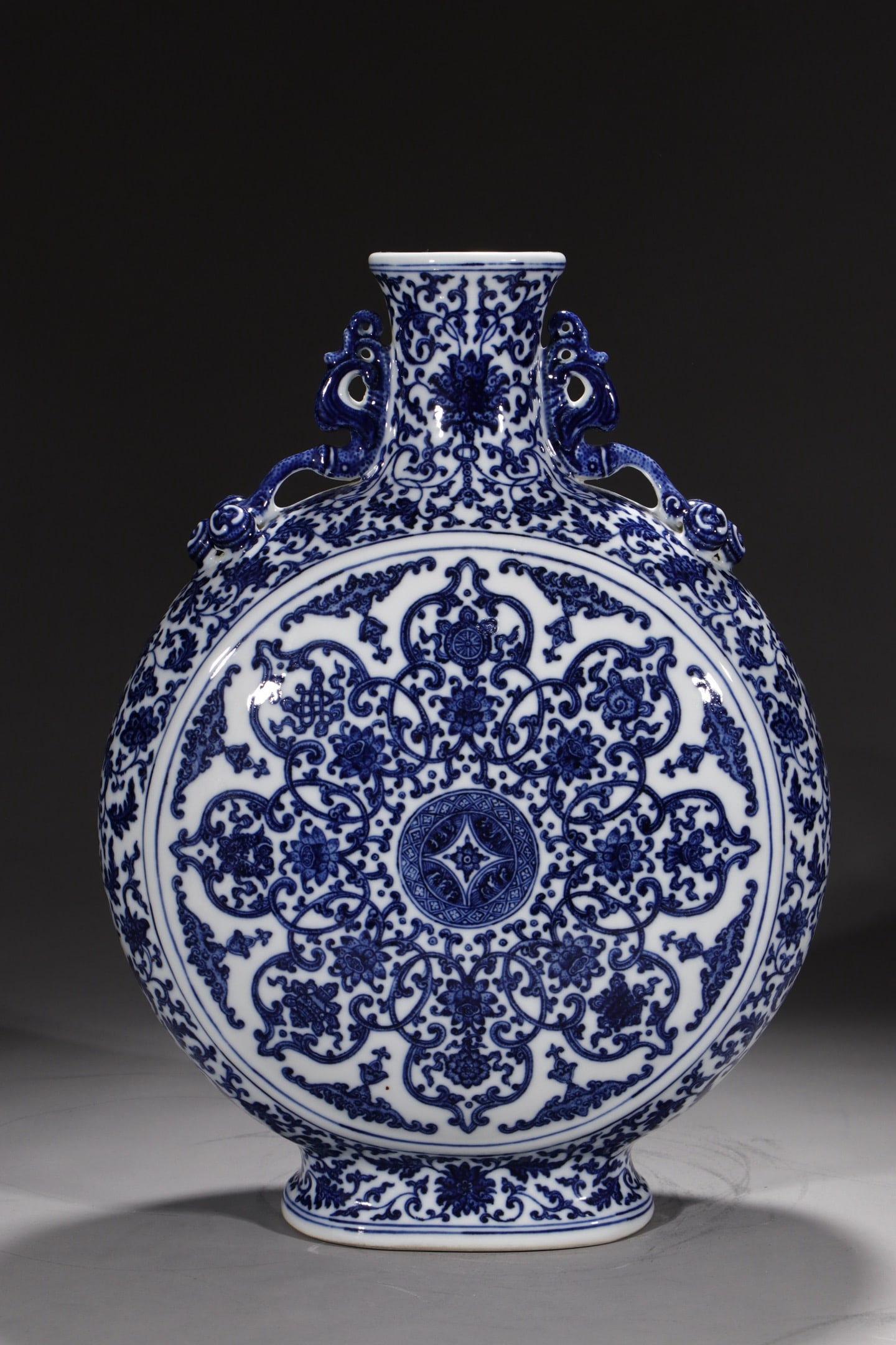 A Huge Blue and White Lotus Pattern Double-Ears Vase: A Huge Blue and White Lotus Pattern Double-Ears Vase,Qing Dynasty,China,Qianlong Six-character Mark,Size:16.3in 青花缠枝莲纹双耳瓶,中国