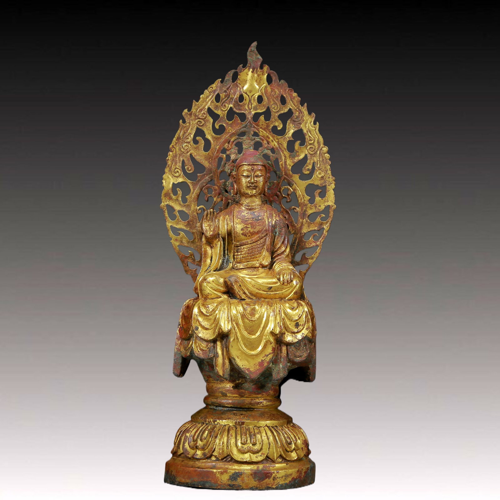 A Solemn Gilt Bronze Statue of Sakyamuni: A Solemn Gilt Bronze Statue of Sakyamuni ,Ming Dynasty, China,Size: 4.7inx13.8in,Weight:1970g 铜鎏金释迦摩尼像，明代