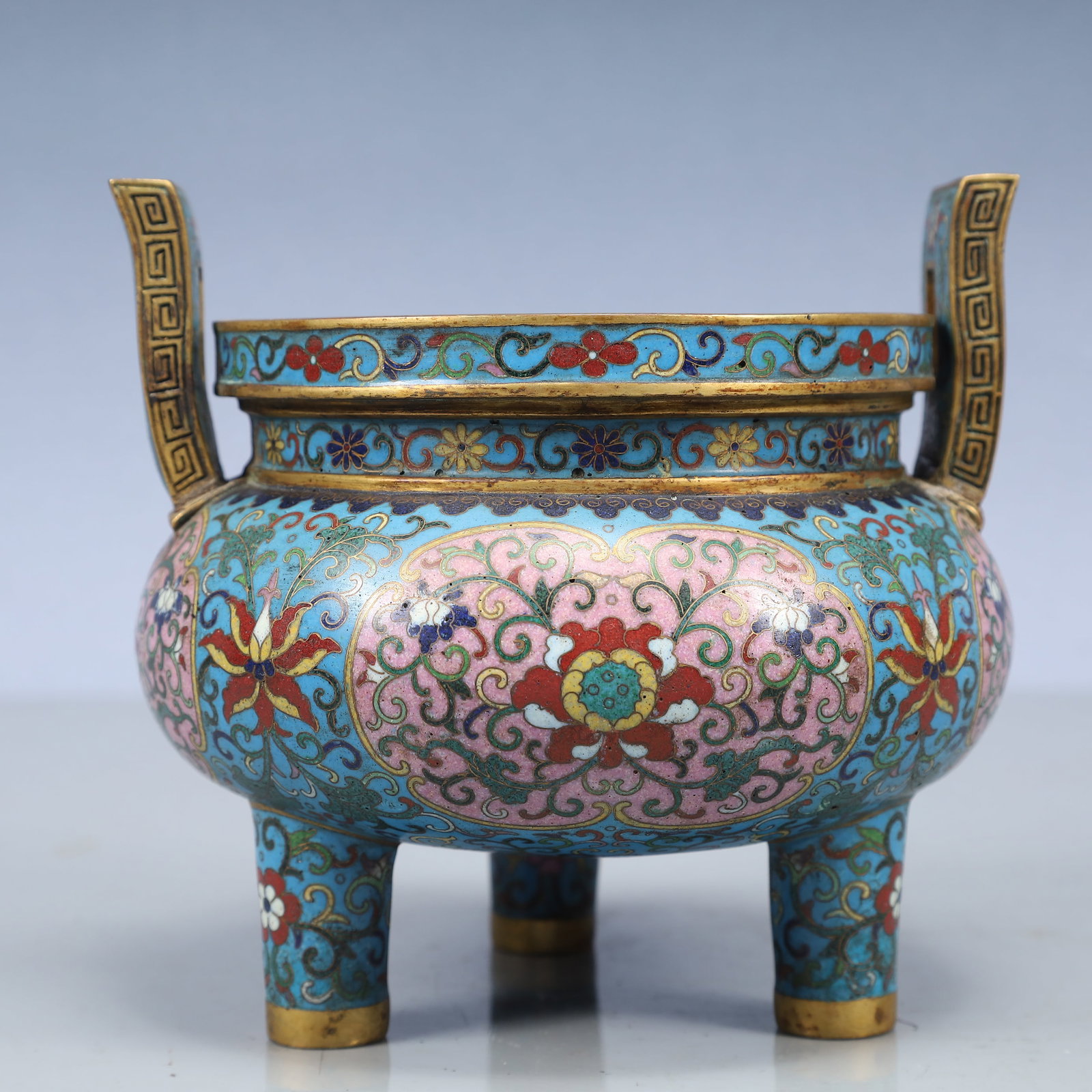 An Exquisite Cloisonne Lotus Pattern Double-Ears and Tripod Censer: An Exquisite Cloisonne Lotus Pattern Double-Ears and Tripod Censer,Qing Dynasty, China,Qianlong Four-character Mark,Size:6.2inx5.7in,Weight:1350g 景泰蓝缠枝莲ಬ