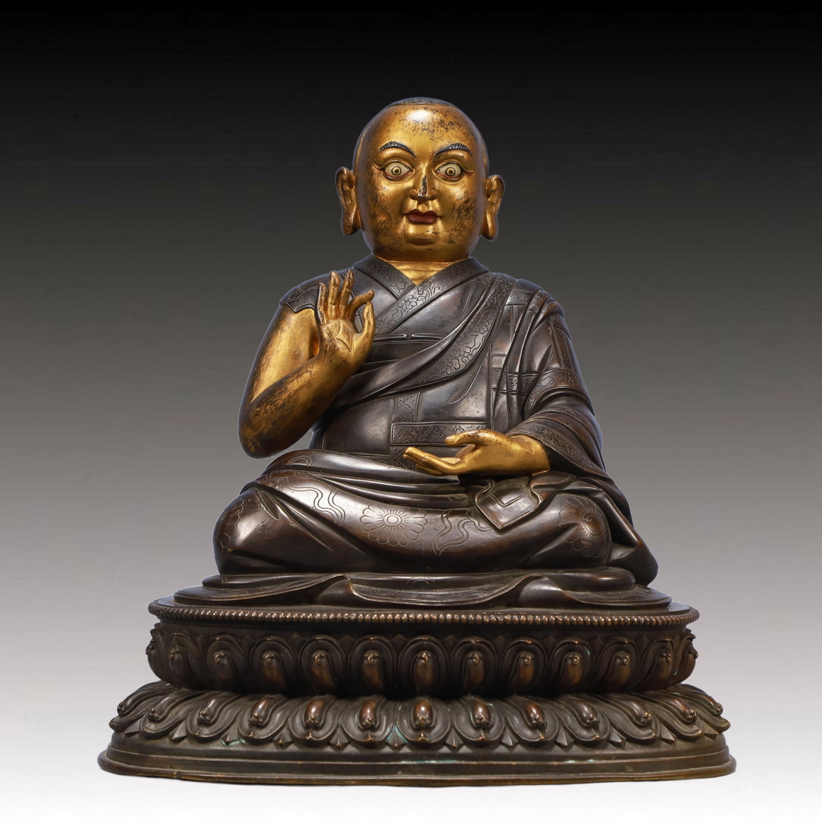 A Solemn Gilt Bronze Statue of Guru: A Solemn Gilt Bronze Statue of Guru,Ming Dynasty, China,Size:10.6inx7.9inx11inWeigh:6100g 铜鎏金上师像,中国明代
