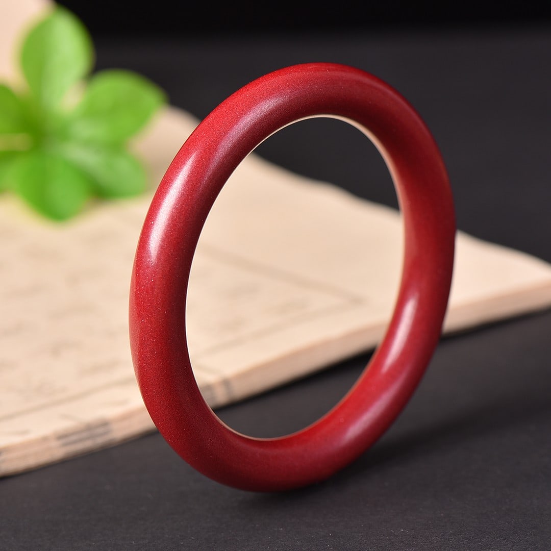 An Exquisite Cinnabar Bracelets: An Exquisite Cinnabar Bracelet,Size:2inx2.4in (寓意)寓意主要包括吉祥喜庆、驱邪避凶、安