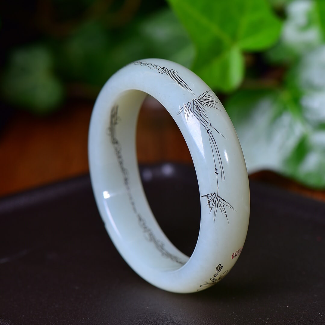 An Exquisite White Jade Bamboo and Butterfly Pattern Bracelets: An Exquisite White Jade Bamboo and Butterfly Pattern Bracelet (寓意)手镯象征着温婉 和谐 平安 完美【Ņ