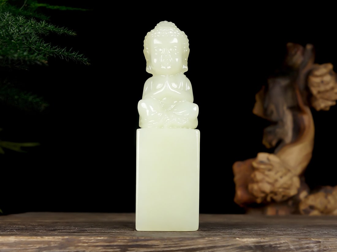 An Exquisite White Jade Buddha Statue Seal: An Exquisite White Jade Buddha Statue Seal,Size:2.6inx0.6inx0.5in 白玉佛像印章
