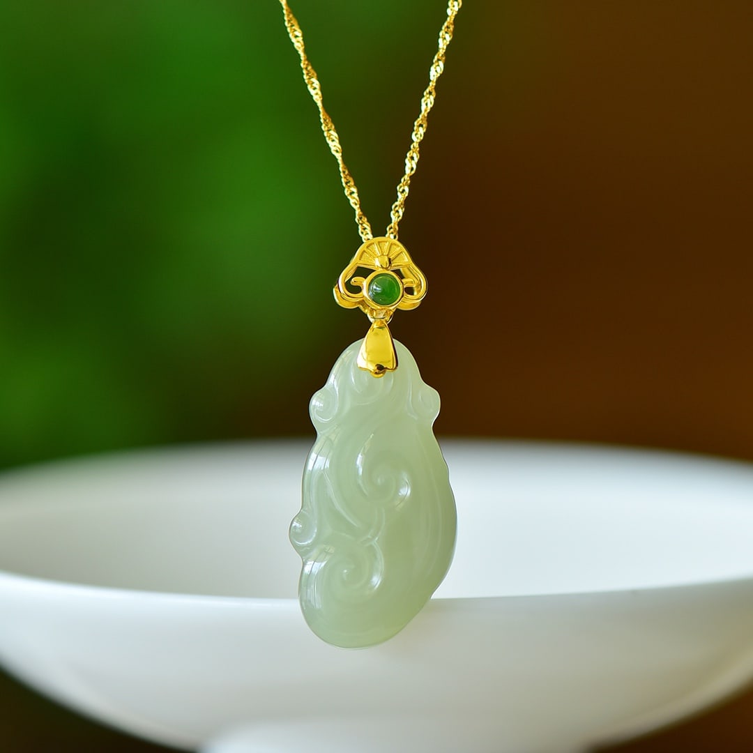 An Exquisite Sterling Silver-Gold Plated Inlaid Greenish Jade Necklace: An Exquisite Sterling Silver-Gold Plated Inlaid Greenish Jade Necklace,Size:0.7inx1.4in 纯银镀金镶青玉项链