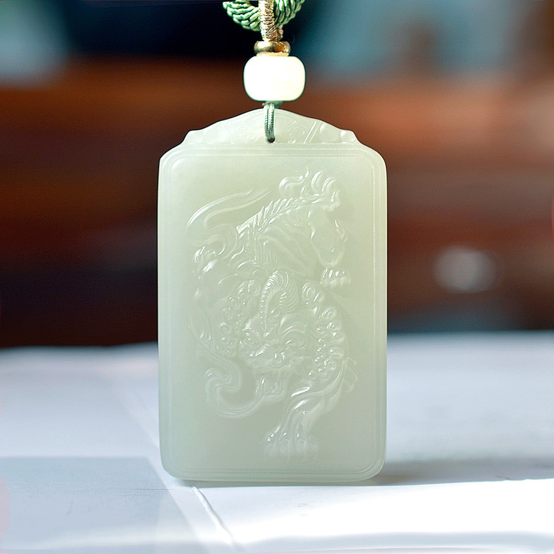 An Exquisite White Jade Kylin Pendant: An Exquisite White Jade Kylin Pendant,Size:1.2inx2in 白玉麒麟挂件