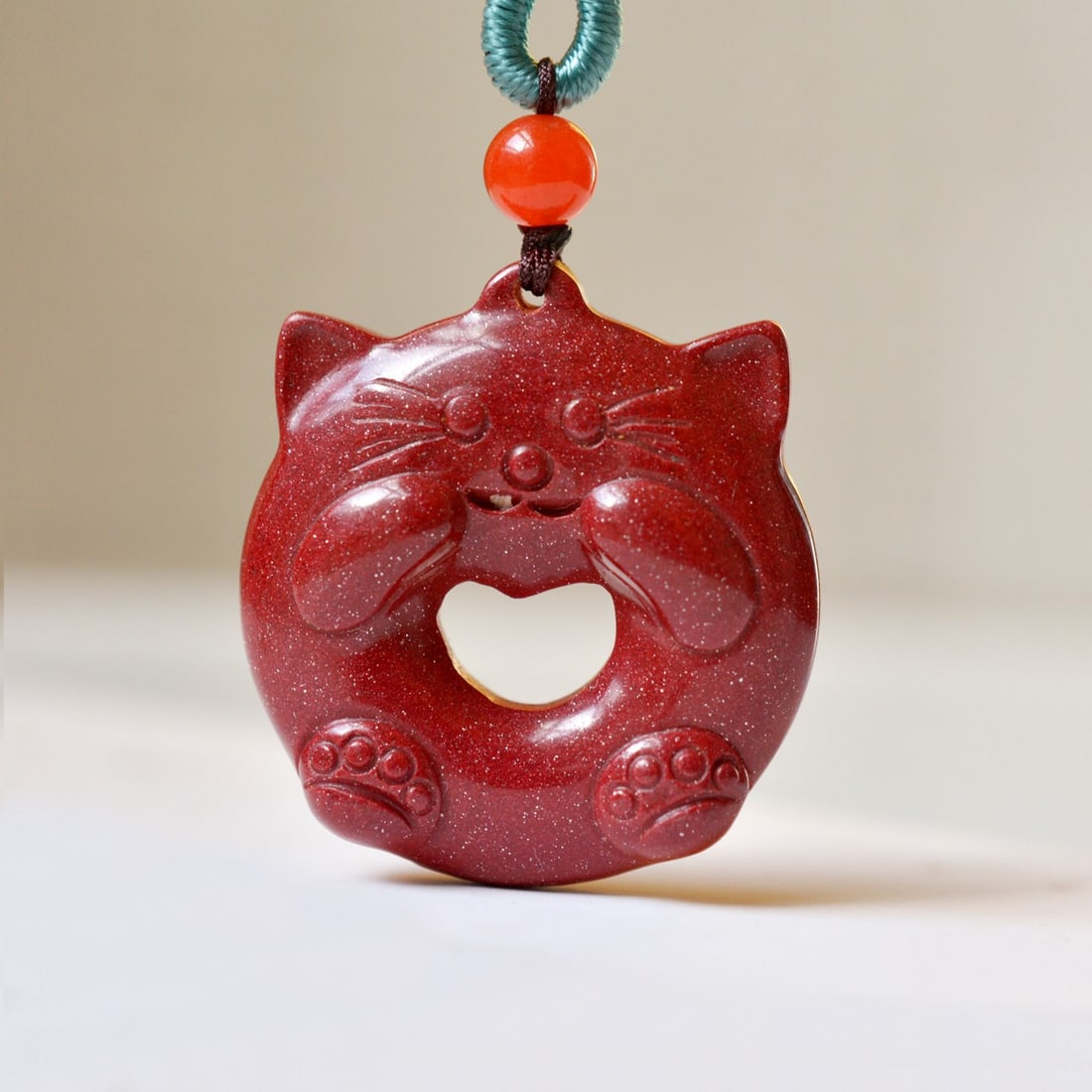 An Exquisite Cinnabar Cat Pendant: An Exquisite Cinnabar Cat Pendant,Size:1inx1.1in,Weight:10.7g 朱砂猫挂件
