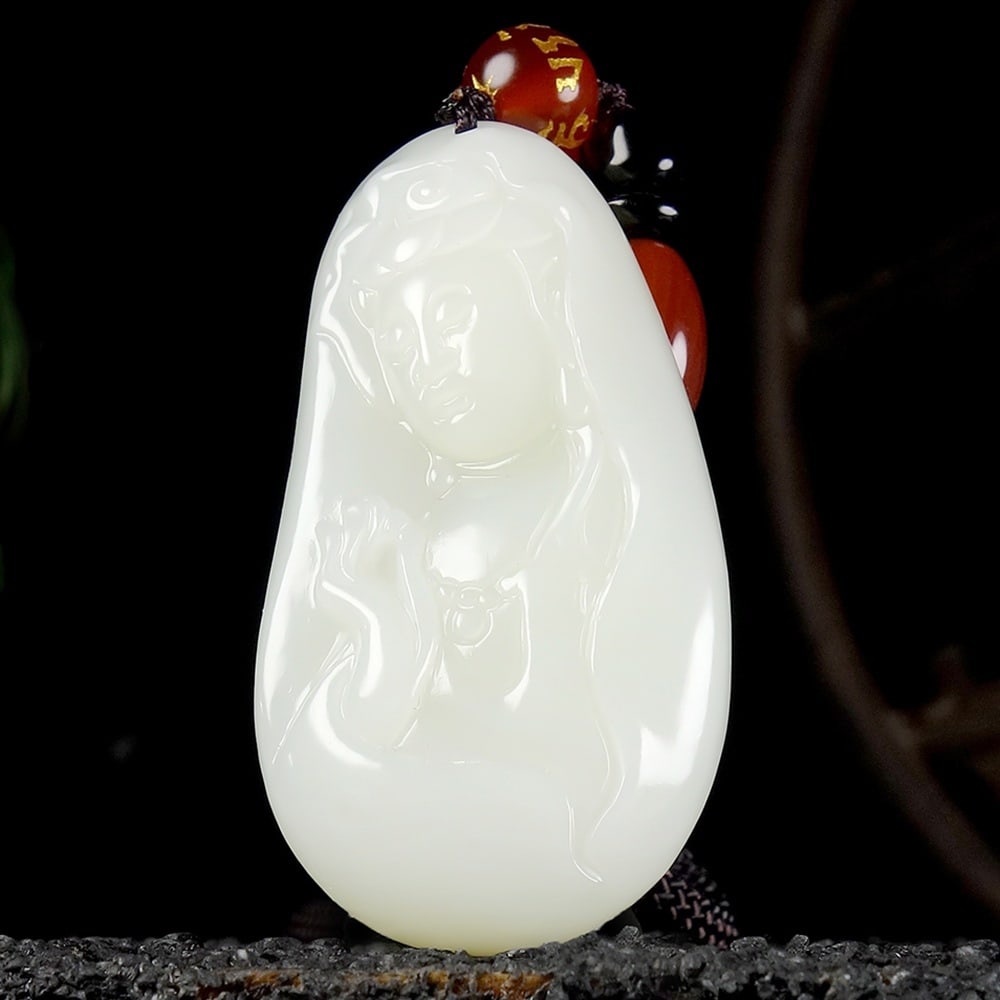 An Exquisite White Jade Statue of Avalokitesvara Pendant: An Exquisite White Jade Statue of Avalokitesvara Pendant,Size:2inx1inx0.3in 白玉观音像挂件