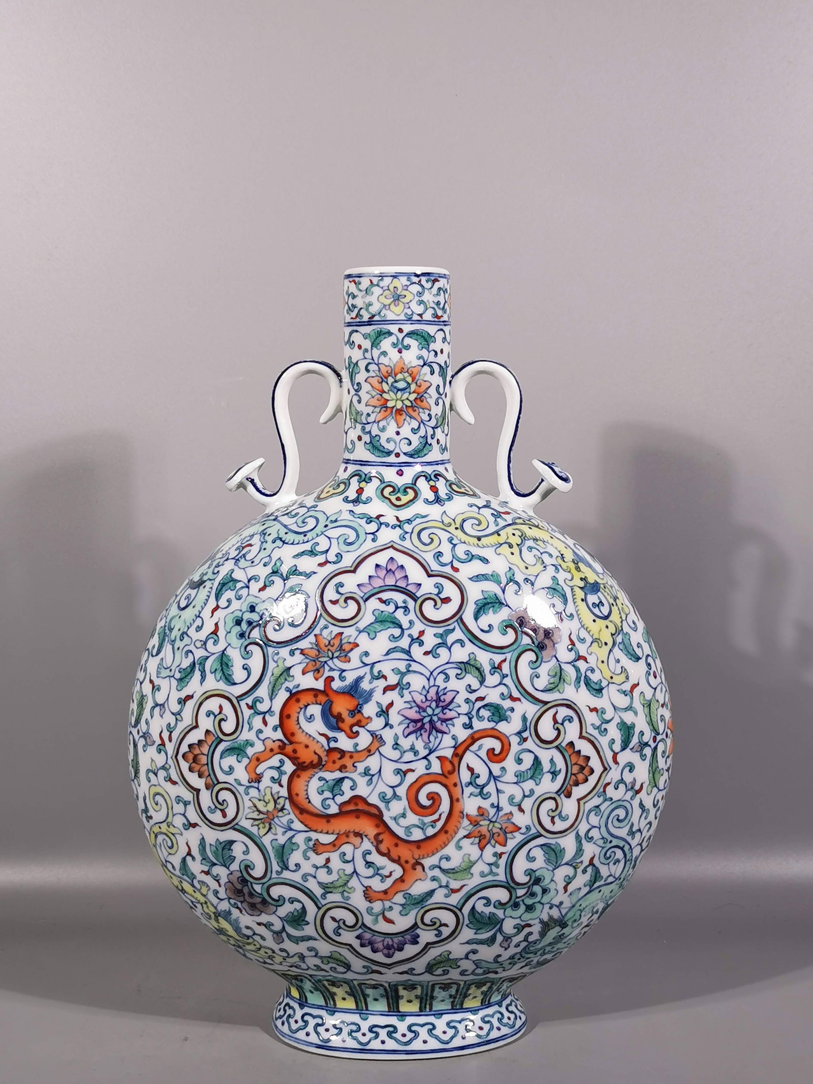 A Exquisite Blue and White Doucai Lotus and Dragon Pattern Double-Ears Vase: A Exquisite Blue and White Doucai Lotus and Dragon Pattern Double-Ears Vase,Qing Dynasty, China,Yongzheng Six-character Mark,Size:14inx9.8in 