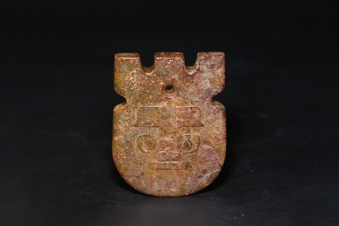 A Exquisite Gaogu Jade Beast-Face Pattern Weapon (1 of 9)