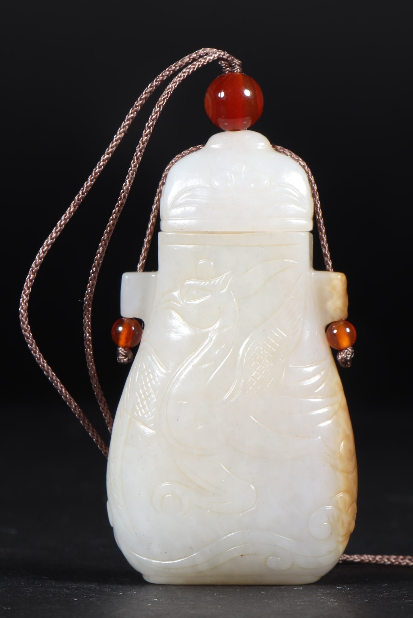 A Exquisite Hotan Jade Phoenix Pattern Ornament: A Exquisite Hotan Jade Phoenix Pattern Ornament,Tang Dynasty, China,Size:1.4inx0.6inx2.4in,Weight:35g 和田玉凤纹香囊,中国唐代