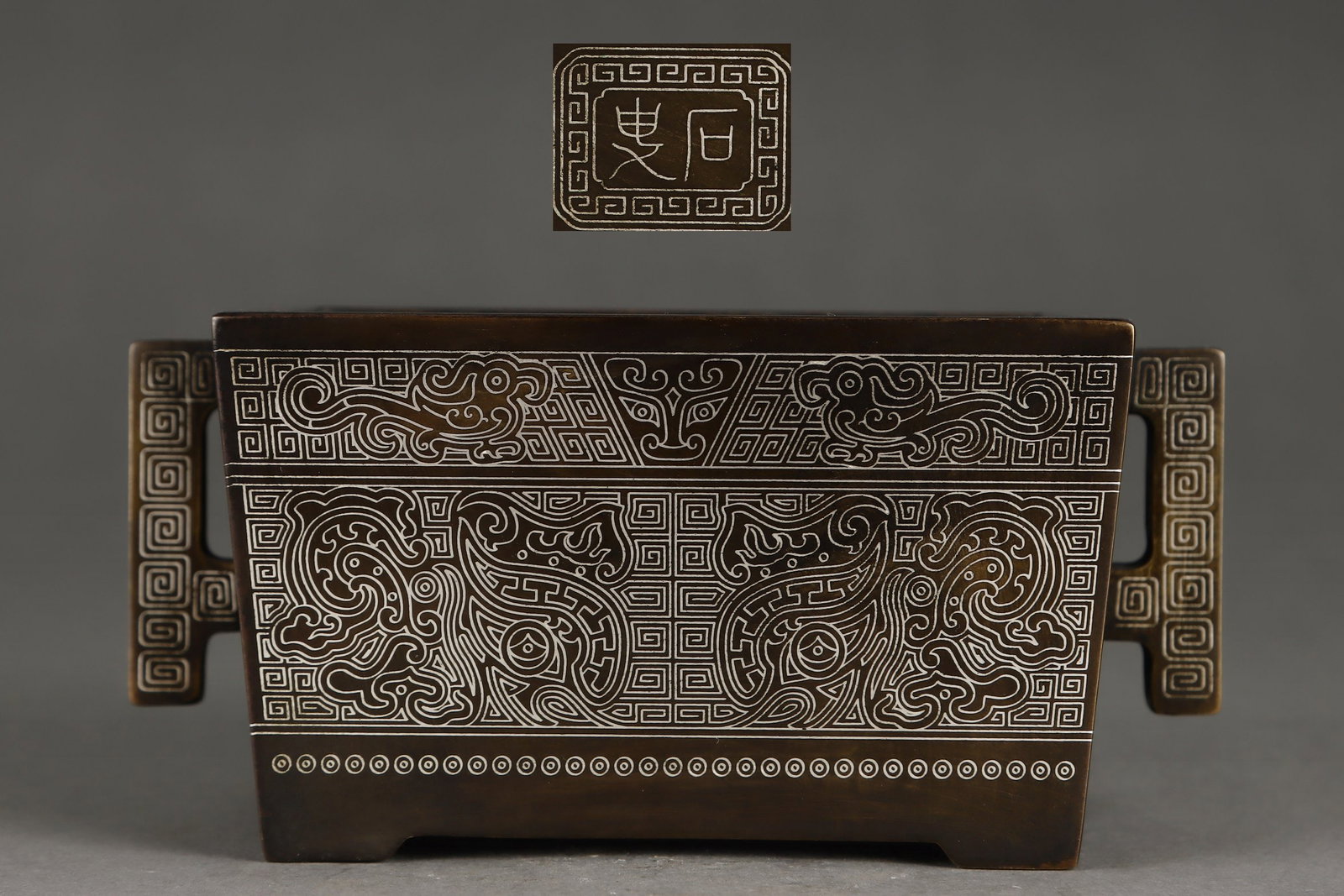 A Exquisite Silver Inlaid Bronze Dragon Pattern Censer: A Exquisite Silver Inlaid Bronze Dragon Pattern Censer,Ming Dynasty, China,With Mark,Size:2.6inx3.1inx4.3inx5.6in,Weight:1750g 铜错银龙纹炉,中国明