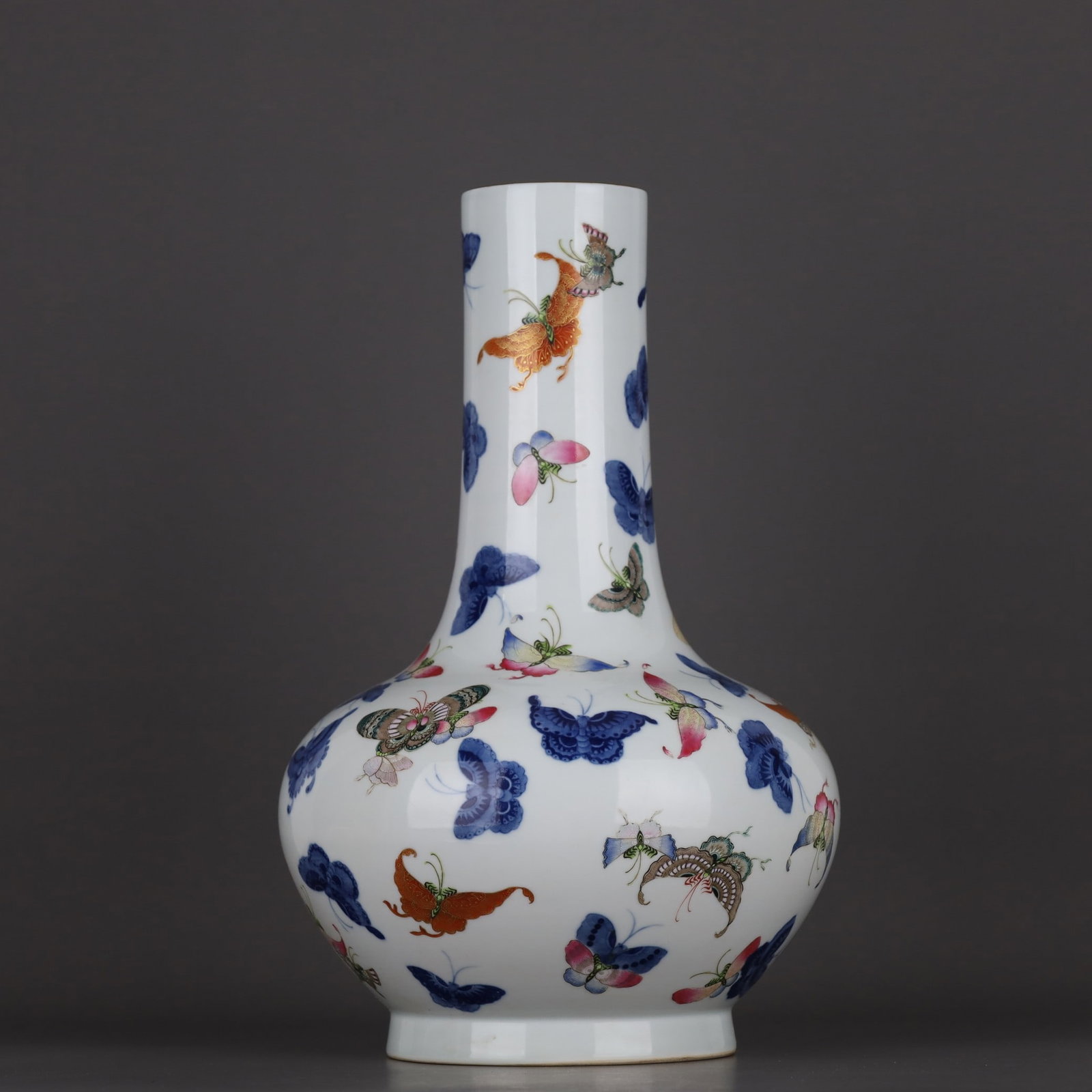A Exquisite Blue and White Famille-Rose Butterfly Pattern Vase: A Exquisite Blue and White Famille-Rose Butterfly Pattern Vase,Qing Dynasty, China,Qianlong Six-character Mark,Size:14.6inx9.6in 青花粉彩蝴蝶纹瓶,ߑ