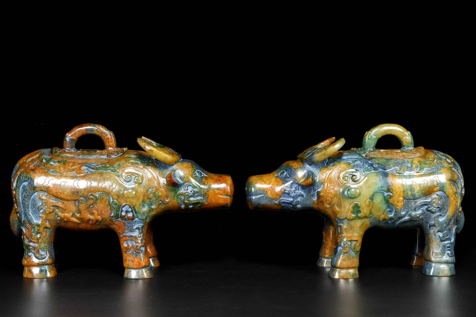 A pair of Exquisite Hotan Jade Buffalo Ornament: A pair of Exquisite Hotan Jade Buffalo Ornament,Ancient Time, China,Size:11inx4.3inx7.9in,Weight:7800g 