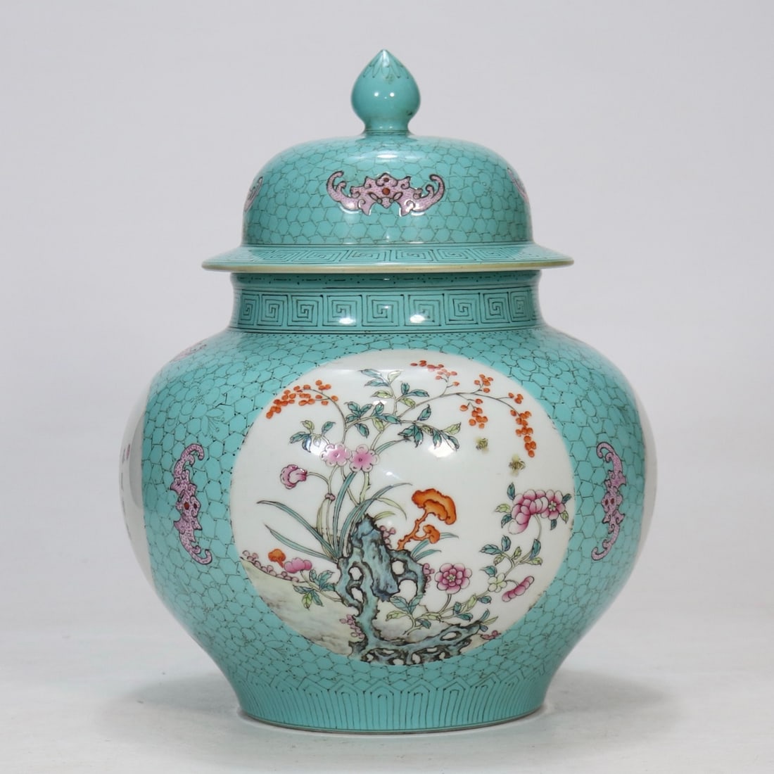 A Exquisite Turquoise-Glazed Flower Pattern Jar: A Exquisite Turquoise-Glazed Flower Pattern Jar,Qing Dynasty,China,Qianlong Six-character Mark,Size:10.2inx8.7inx4.7in 