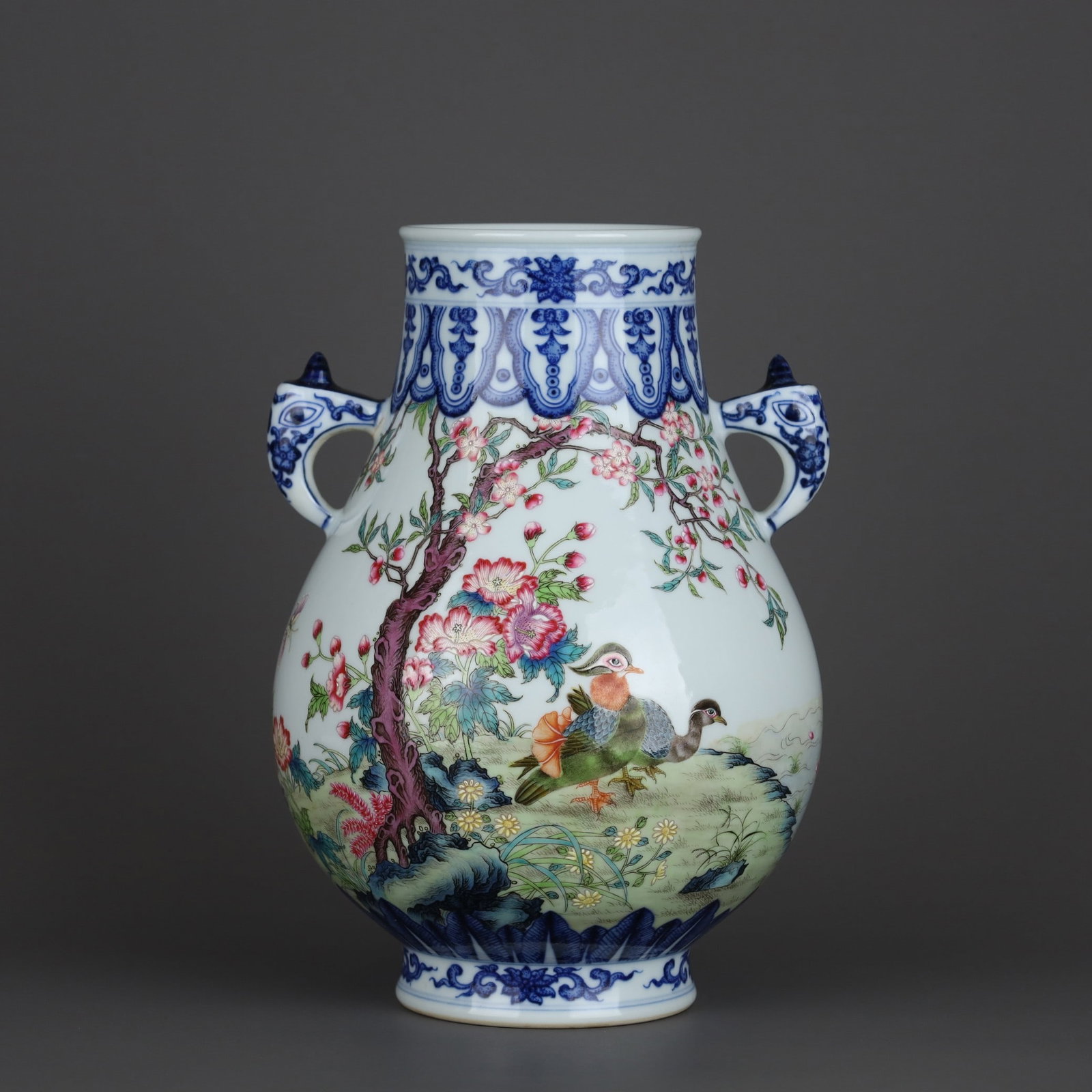 A Exquisite Blue and White Famille-Rose Flower and Bird Pattern Double Ears Vase: A Exquisite Blue and White Famille-Rose Flower and Bird Pattern Double Ears Vase,Qing Dynasty, China,Qianlong Six-character Mark,Size:9.9inx7.1in 