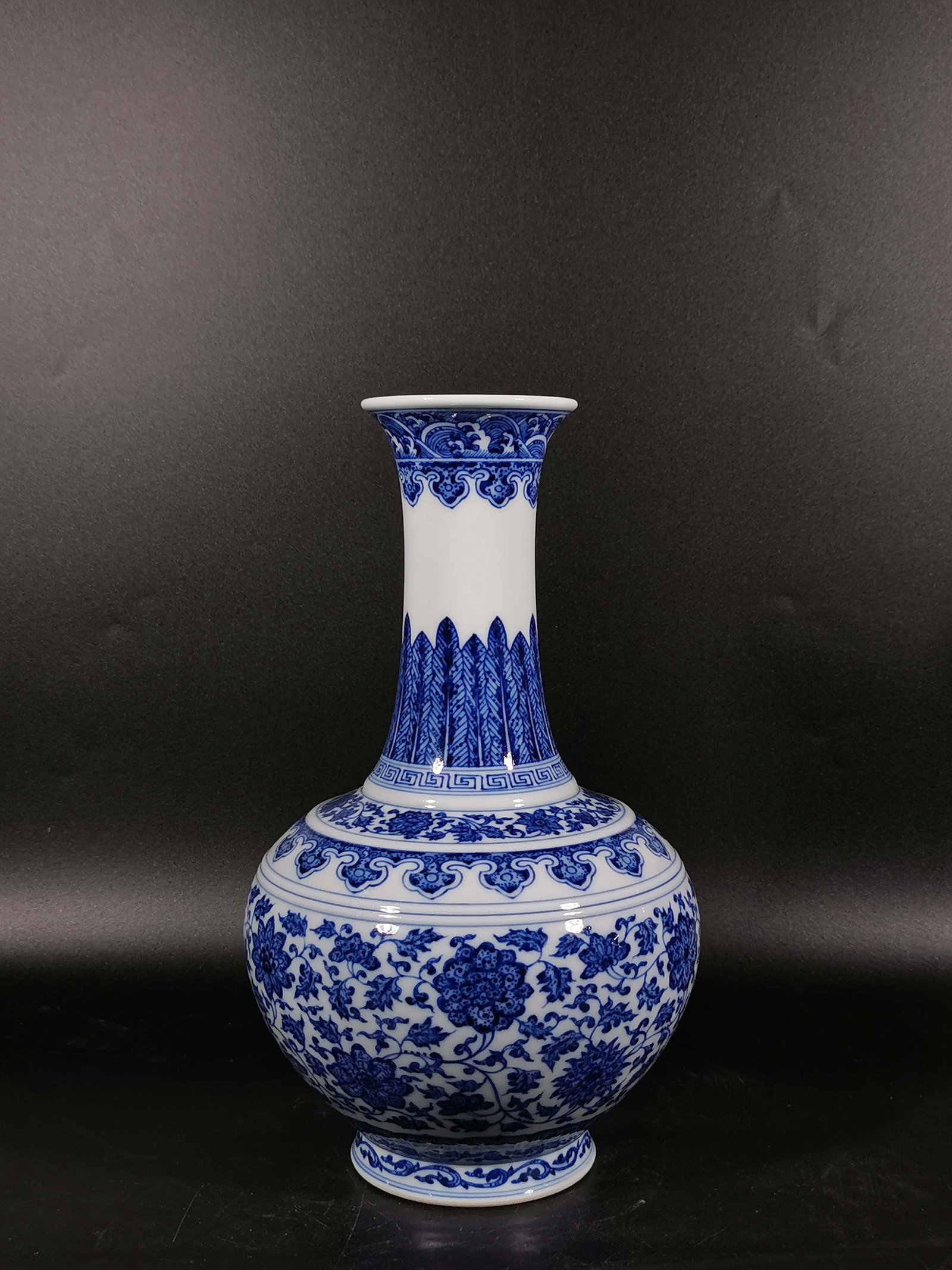 A Exquisite Blue and White Lotus Pattern Vase: A Exquisite Blue and White Lotus Pattern Vase,Qing Dynasty, China,Qianlong Six-character Mark,Size:10.6inx6.4in 青花缠枝莲纹瓶,中国清代