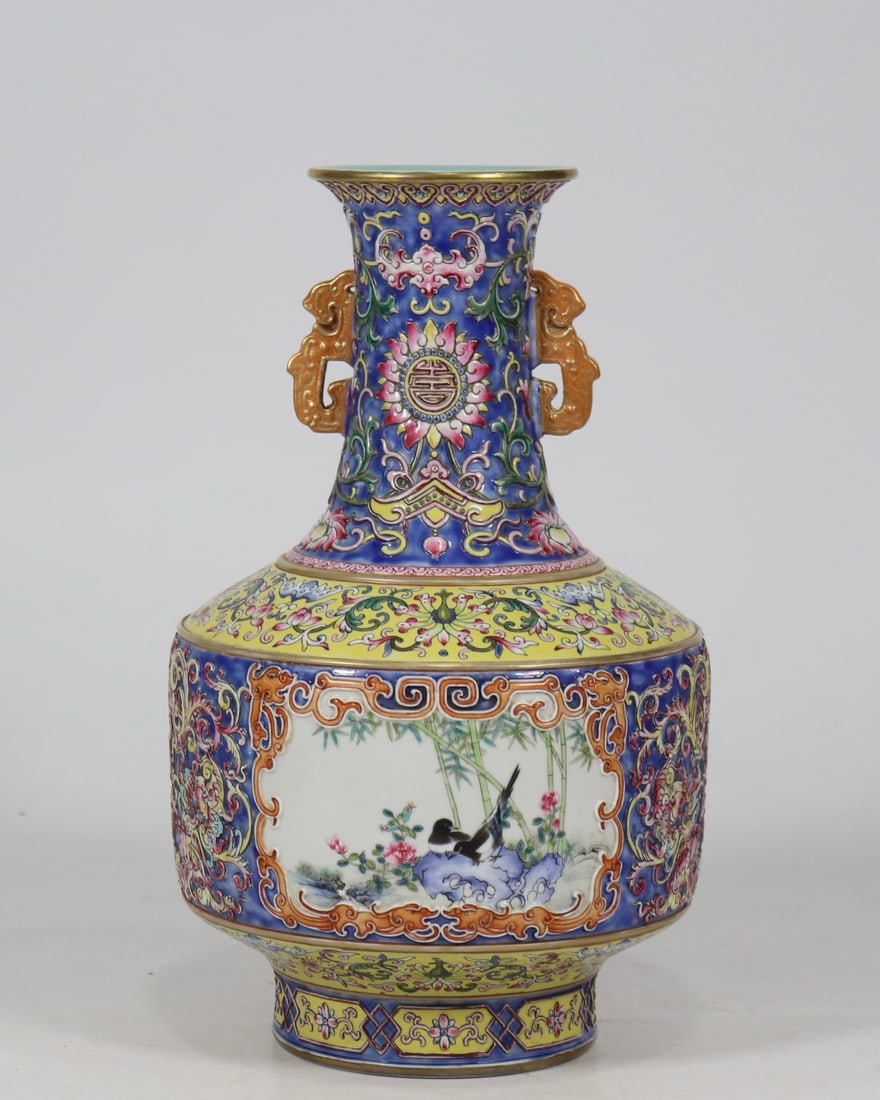 A Exquisite Famille-Rose Flower and Bird Pattern Double Ears Vase: A Exquisite Famille-Rose Flower and Bird Pattern Double Ears Vase,Qing Dynasty,China,Qianlong Six-character Mark,Size:11inx6.5in 粉彩花鸟纹双耳瓶,ߑ