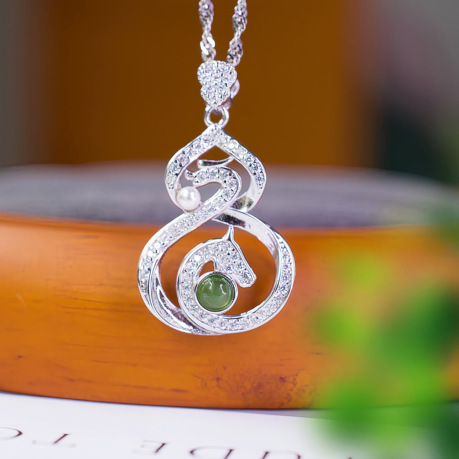 A Exquisite Silver Inlaid Jasper Dragon-Horse and Gourd-shaped Pendant: A Exquisite Silver Inlaid Jasper Dragon-Horse and Gourd-shaped Pendant,Size:0.1inx0.1in 银镶和田碧玉龙马葫芦吊坠