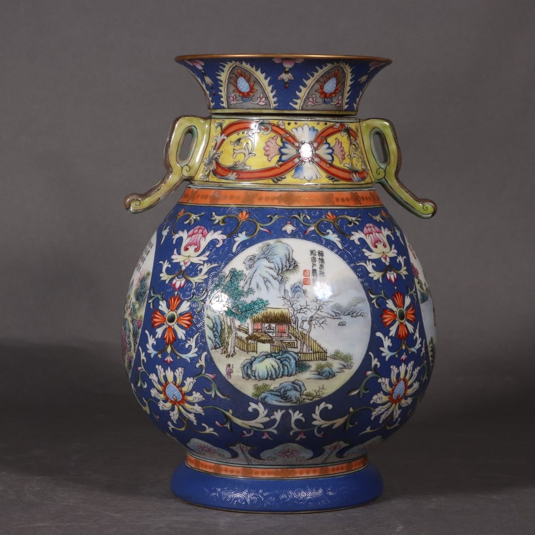 A Exquisite Famille-Rose Blue Ground Landscape Pattern Vase: A Exquisite Famille-Rose Blue Ground Landscape Pattern Vase,Qing Dynasty, China,Qianlong Six-character Mark,Size:10inx5.3inx4.9in 