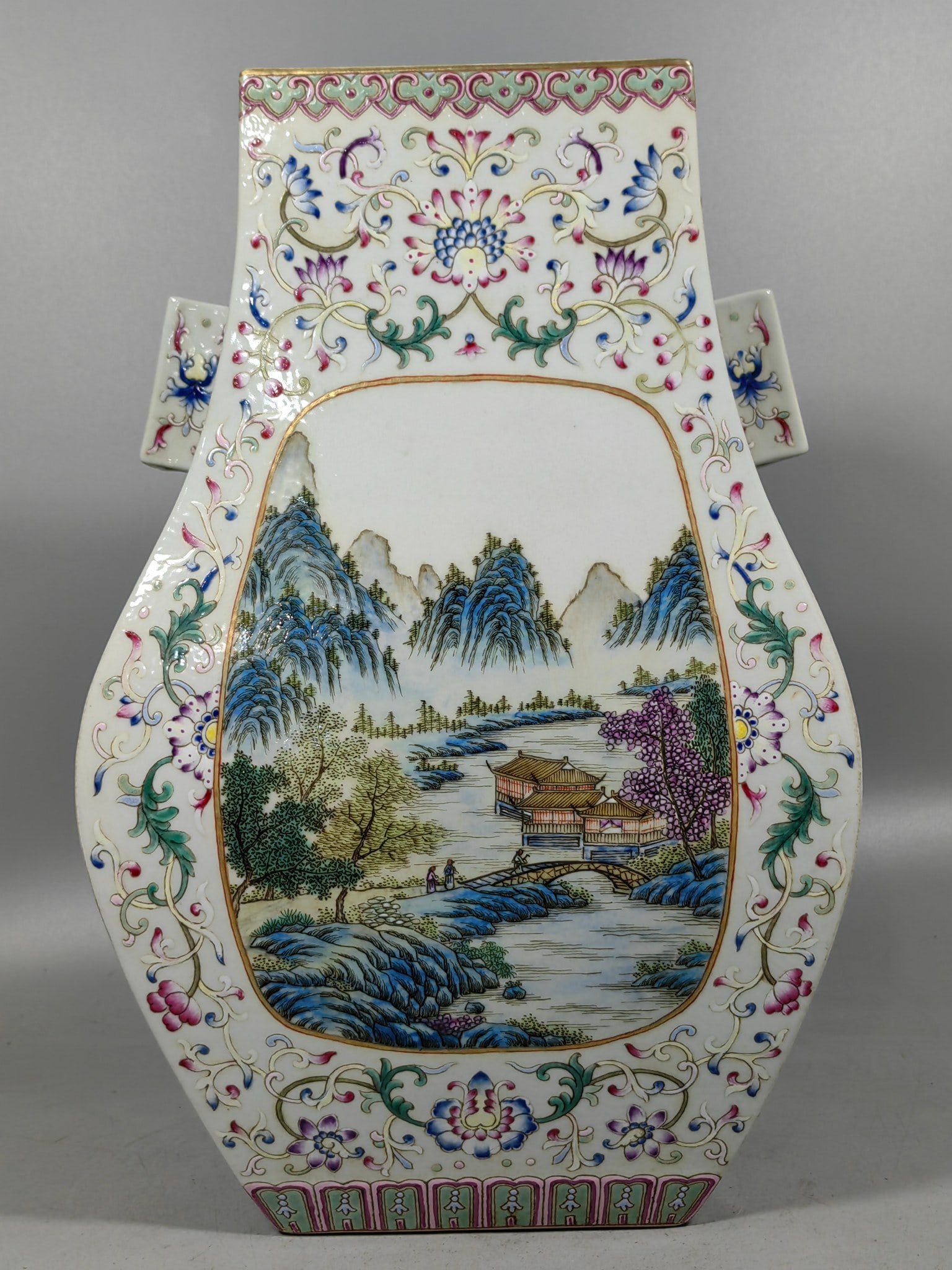 A Exquisite Famille-Rose Landscape Pattern Double-Ears Vase: A Exquisite Famille-Rose Landscape Pattern Double-Ears Vase,Qing Dynasty, China,With Mark,Size:8.1inx5.4inx12.8in 