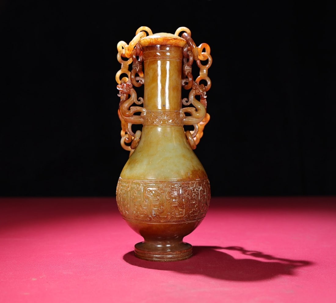 A Exquisite Hotan Jade Beast-Face Pattern Vase: A Exquisite Hotan Jade Beast-Face Pattern Vase,Han Dynasty,China,Size:8.7inx3.6in,Weight:899g 和田玉兽面纹瓶,中国汉代