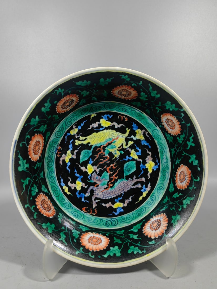 A Exquisite Tri-Color Glazed Kylin Pattern Plate: A Exquisite Tri-Color Glazed Kylin Pattern Plate,Ming Dynasty, China,With Mark,Size:2.5inx8.9in 中国明代,带款,三彩麒麟纹盘