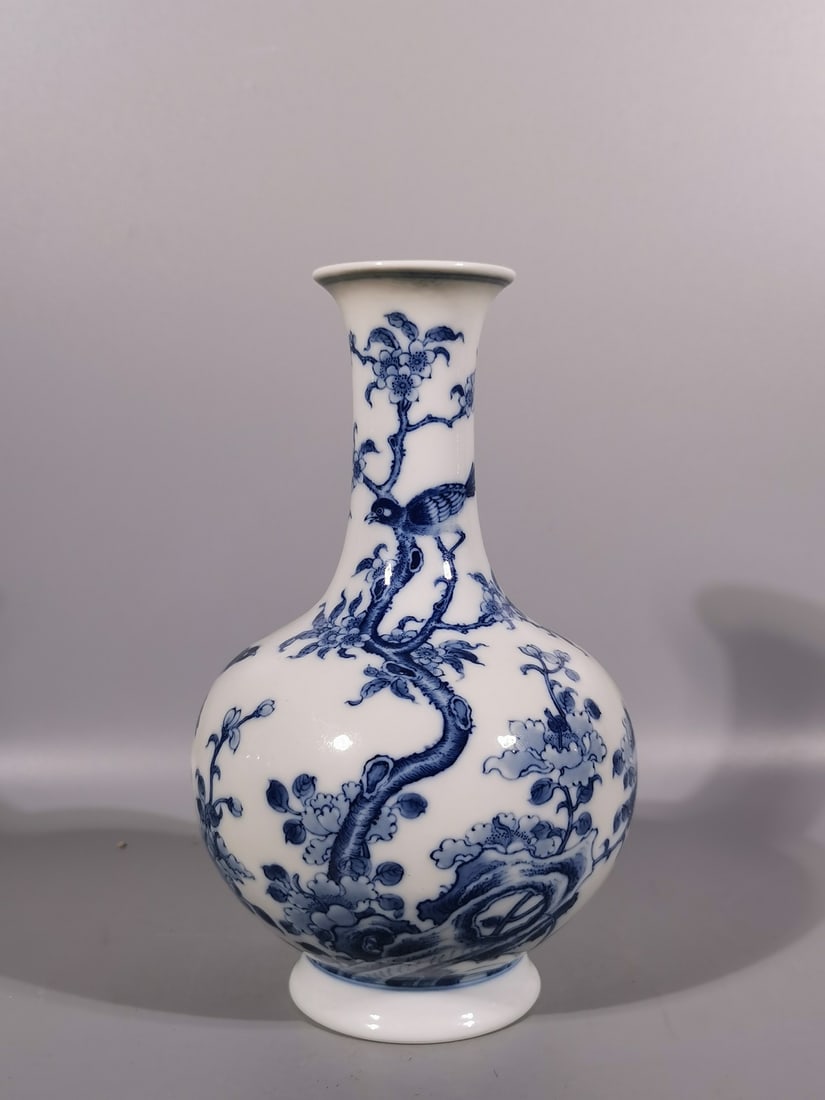 A Exquisite Blue and White Flower and Bird Pattern Vase: A Exquisite Blue and White Flower and Bird Pattern Vase,Qing Dynasty, China,Yongzheng Six-character Mark,Size:7.7inx2.1inx4.7in 
