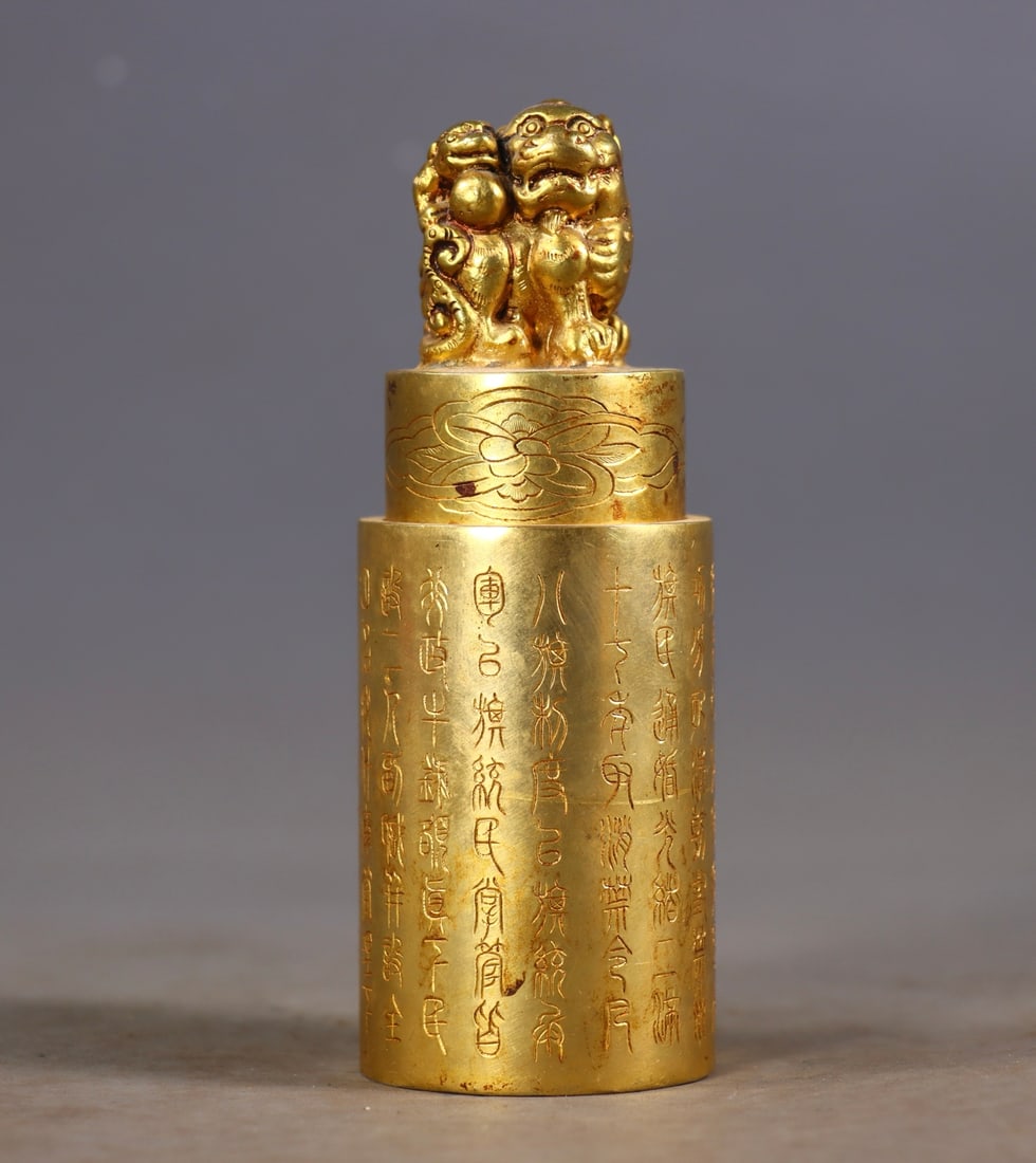 A Exquisite Gilt Bronze Lion Seal: A Exquisite Gilt Bronze Lion Seal,Qing Dynasty, China,Size:4.9inx1.8in,Weight:1229g 铜鎏金狮印章,中国清代