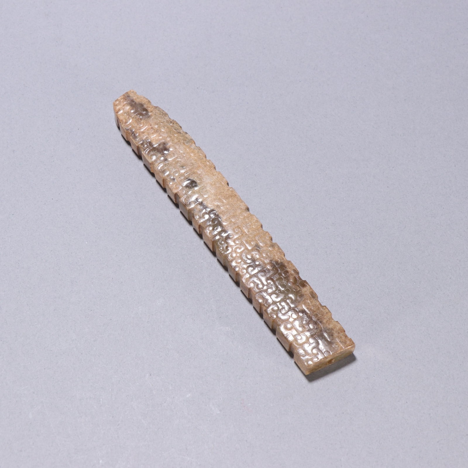 A Exquisite Gao gu Jade Ornament: A Exquisite Gao gu Jade Ornament,Han Dynasty, China,Size:5.5inx0.8in, Weight:65.3g 高古玉勒子,中国汉代