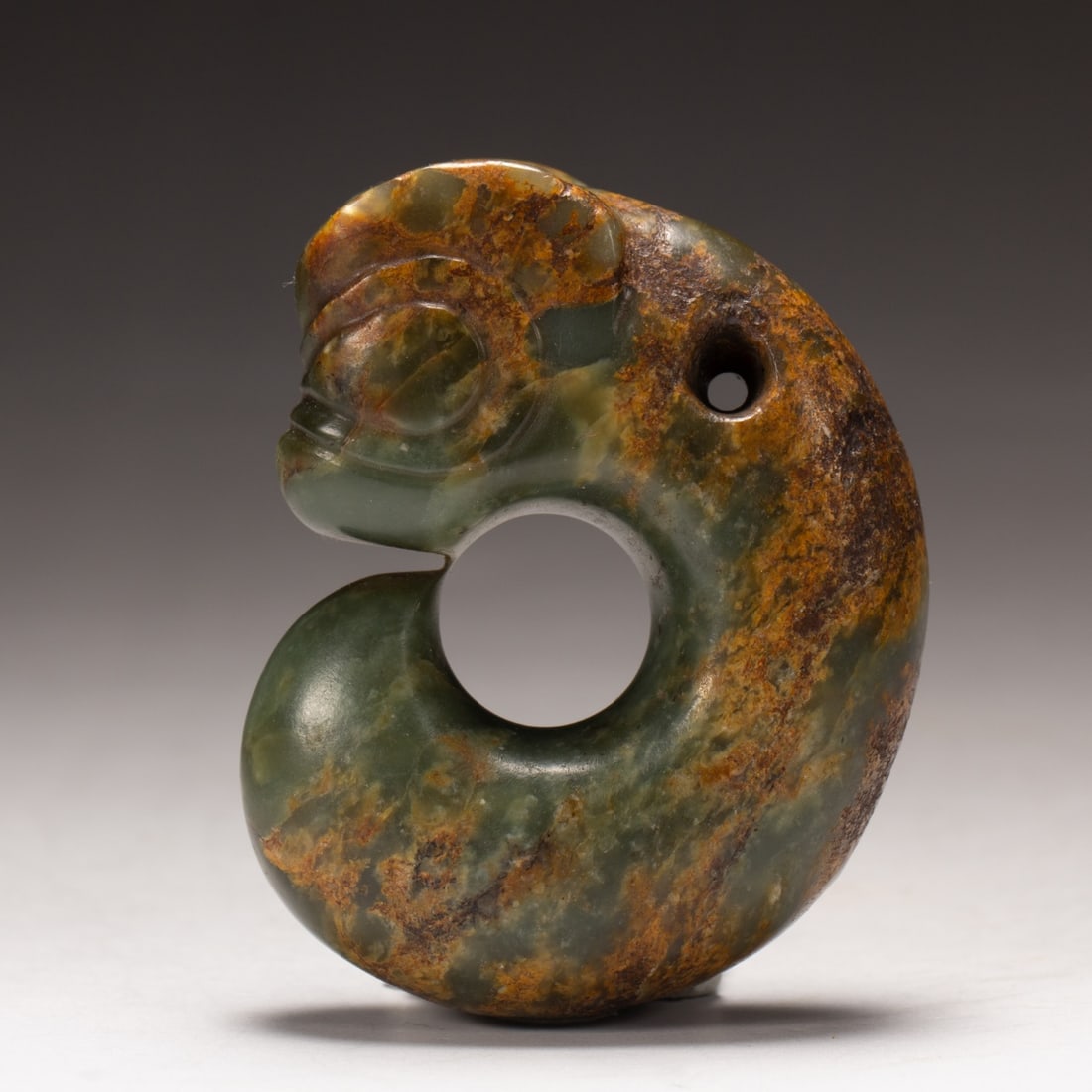 A Exquisite Gaogu Jade Dragon: A Exquisite Gaogu Jade Dragon,Qing Dynasty, China,Size:2.2inx0.8in,Height:2.7in,Weight:140g 高古玉龙,中国清代