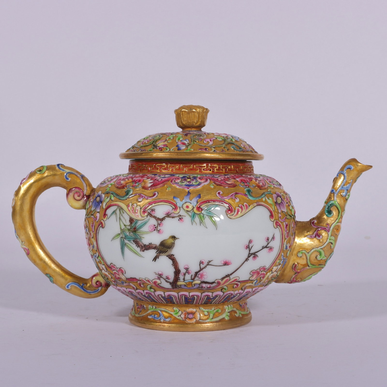 A Exquisite Famille-Rose Gold Ground Flower and Bird Pattern Ewer: A Exquisite Famille-Rose Gold Ground Flower and Bird Pattern Ewer,Qing Dynasty, China,Qianlong Six-character Mark,Size:4.3inx2.5inx3.9inx2.4in 