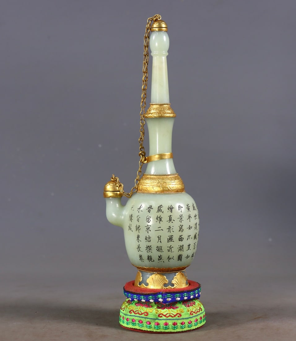 A Exquisite Hetian White Jade Gold-Covered Inlaid Gems Vase: A Exquisite Hetian White Jade Gold-Covered Inlaid Gems Vase,Qing Dynasty, China,Qianlong Four-character Mark,Size:8.7inx2.8inx2.2in,Weight:278g 