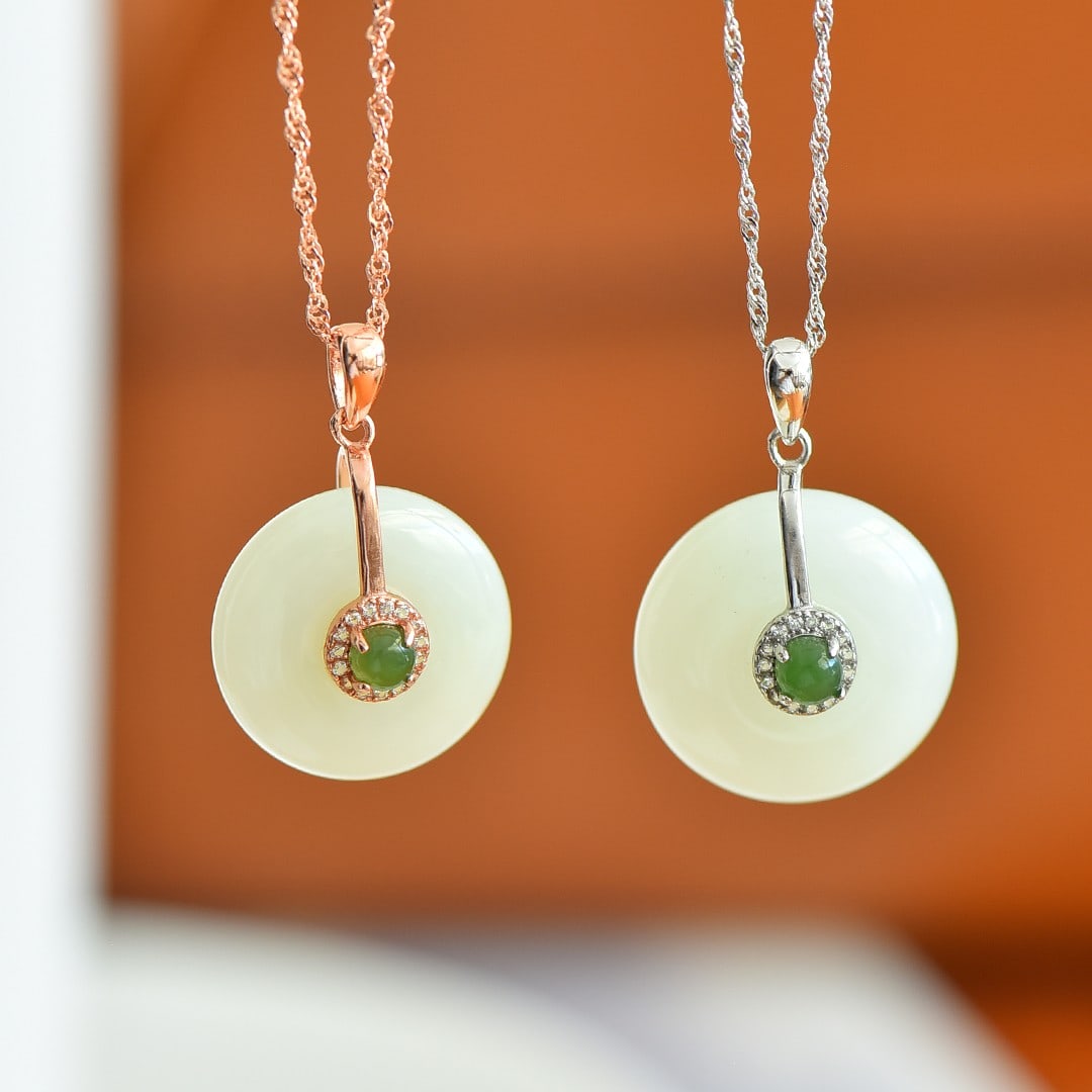 A pair of Exquisite Silver Inlaid Hotan Jade Pendant: A pair of Exquisite Silver Inlaid Hotan Jade Pendants,Size:0.8inx0.8in 一对银镶和田玉平安扣吊坠