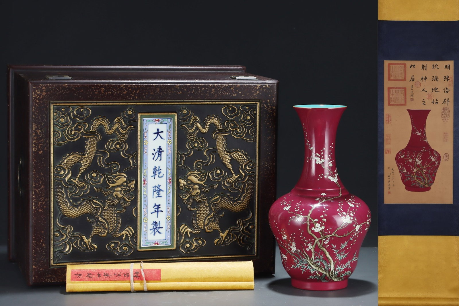 A Rare Red Glazed Famille-Rose Painted Gold Flower Pattern Vase,With Vertical Scroll Painting on: A Rare Red Glazed Famille-Rose Painted Gold Flower Pattern Vase,With Vertical Scroll Painting on Silk,Qing Dynasty, China,Qianlong Four-character Mark,Size:14inx8in,(Without frame)24.4inx11.8in 