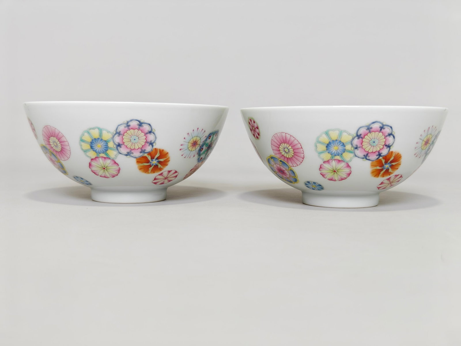 A Pair of Exquisite Famille-Rose Flower Pattern Bowls: A Pair of Exquisite Famille-Rose Flower Pattern Bowls,Qing Dynasty,China,Yongzheng Six-character Mark,Size:2.7inx5.7in 一对粉彩花卉纹碗,中国