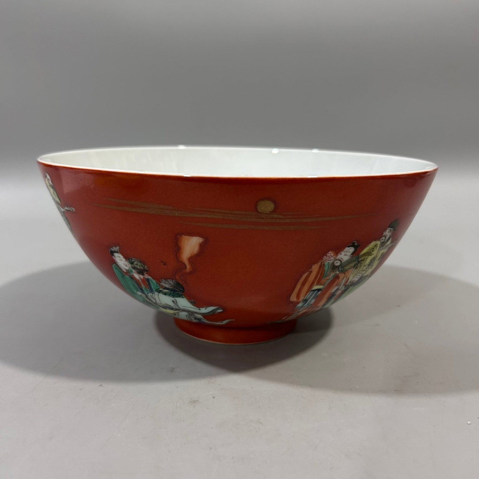An Exquisite Red Ground Famille-Rose Figure Pattern Bowl: An Exquisite Red Ground Famille-Rose Figure Pattern Bowl,Qing Dynasty,China,Kangxi Six-character Mark,Size:8.3inx3.9in 