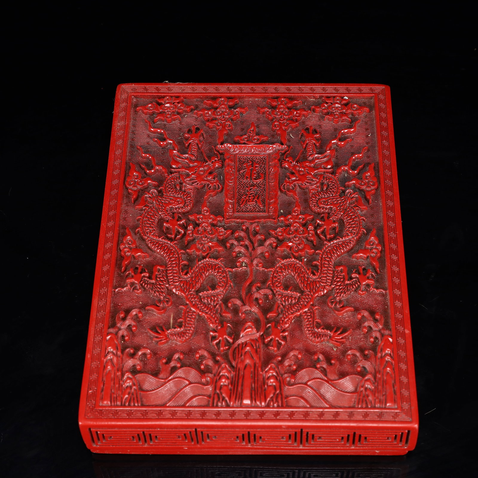 An Exquisite Carved Red Lacquer Dragon Pattern Box with Cover: An Exquisite Carved Red Lacquer Dragon Pattern Box with Cover,Qing Dynasty, China,Qianlong Four-character Mark,Size:8.3inx5.9inx1.6in,Weight:1000g 