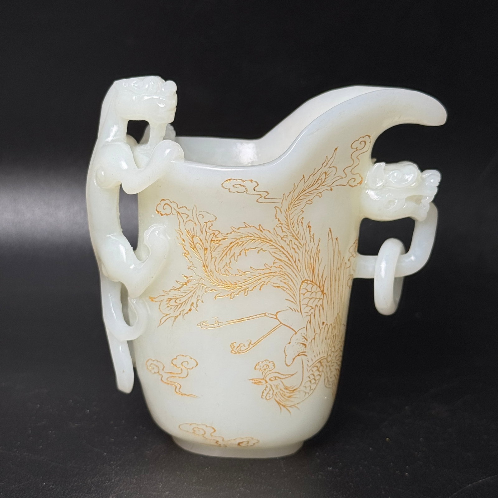 An Exquisite White Jade Painted Gold Dragon and Phoenix Pattern Dragon-Ears Cup: An Exquisite White Jade Painted Gold Dragon and Phoenix Pattern Dragon-Ears Cup,Qing Dynasty,China,Size:98mmx91mmx54mm,Weight:213g 