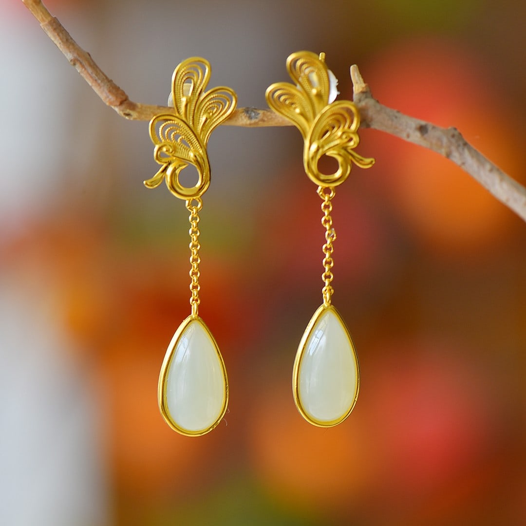A Pair of Exquisite Sterling Silver-Gold Plated Inlaid White Jade Earrings: A Pair of Exquisite Sterling Silver-Gold Plated Inlaid White Jade Earrings,Size:8mmx16mm 一对纯银镀金镶白玉耳环