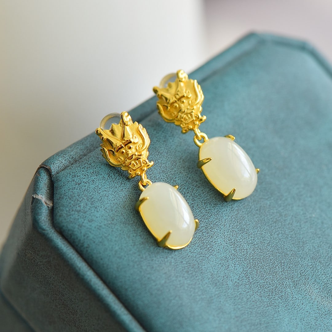 A Pair of Exquisite Sterling Silver-Gold Plated Inlaid White Jade Earrings: A Pair of Exquisite Sterling Silver-Gold Plated Inlaid White Jade Earrings,Size:8mmx12mm 一对纯银镀金镶白玉耳环
